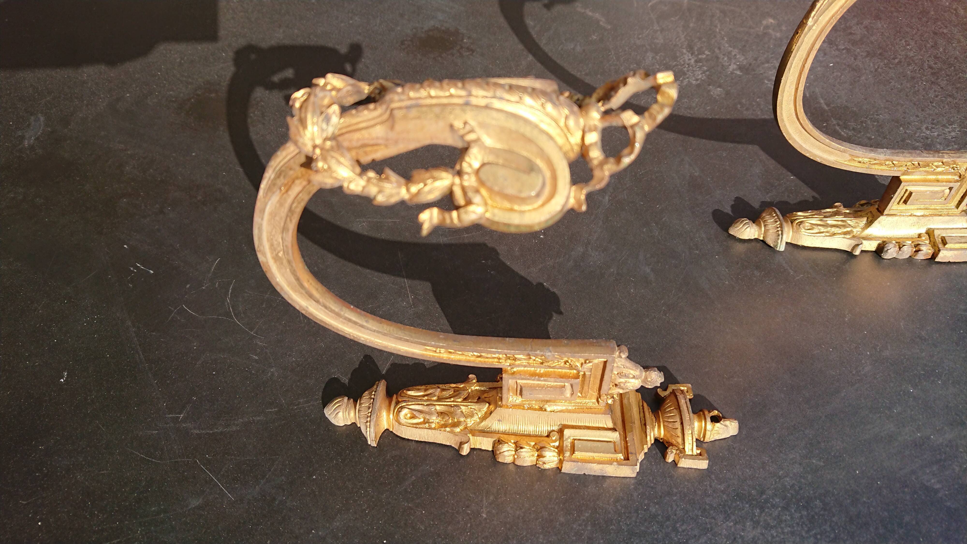 Paire de porte-embrasses en bronze doré