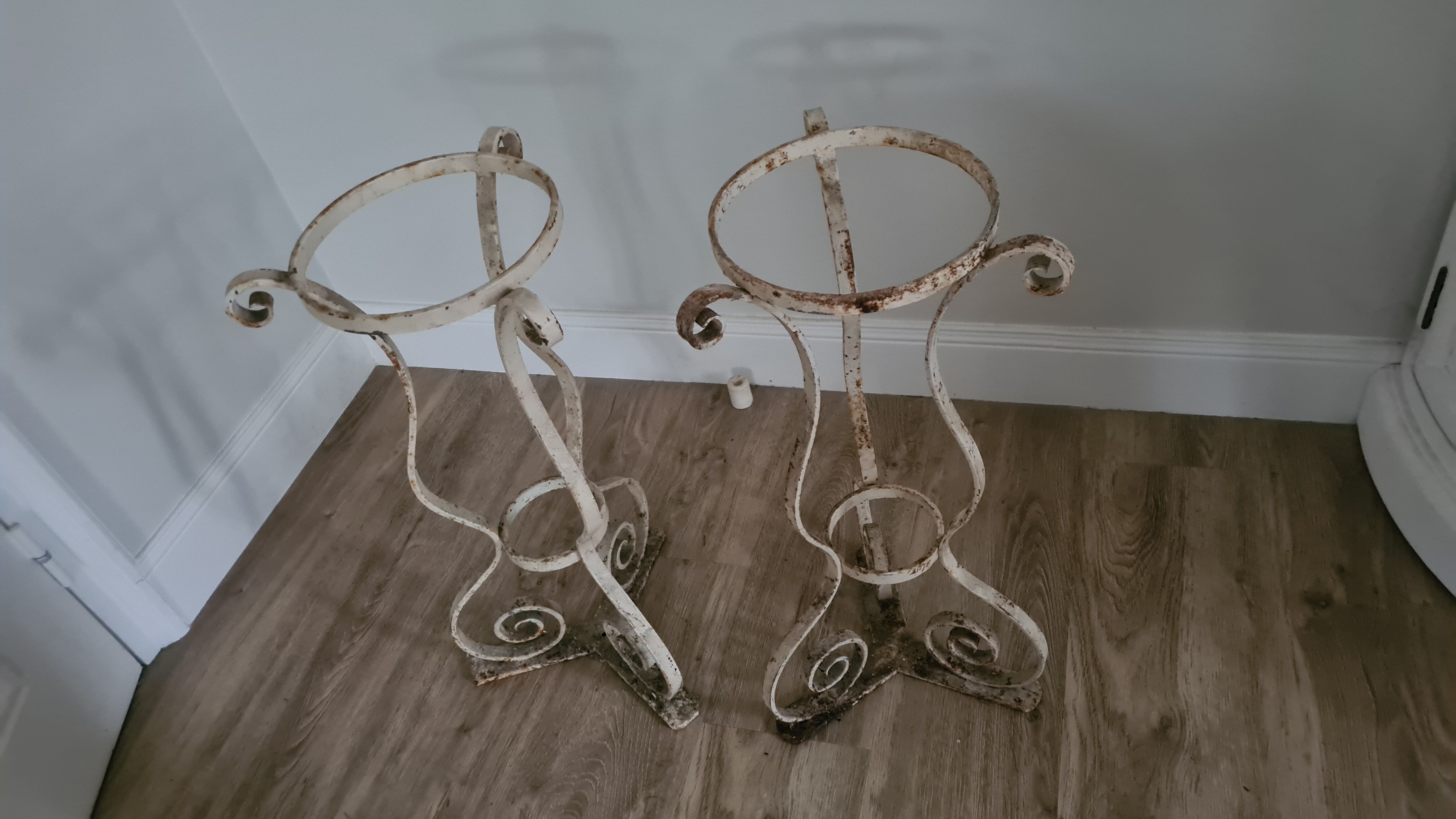 Pair of old pot holders in original cast iron / patina