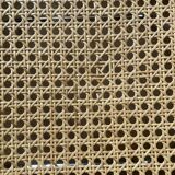 Plia chairs by Castelli in wood and cane.