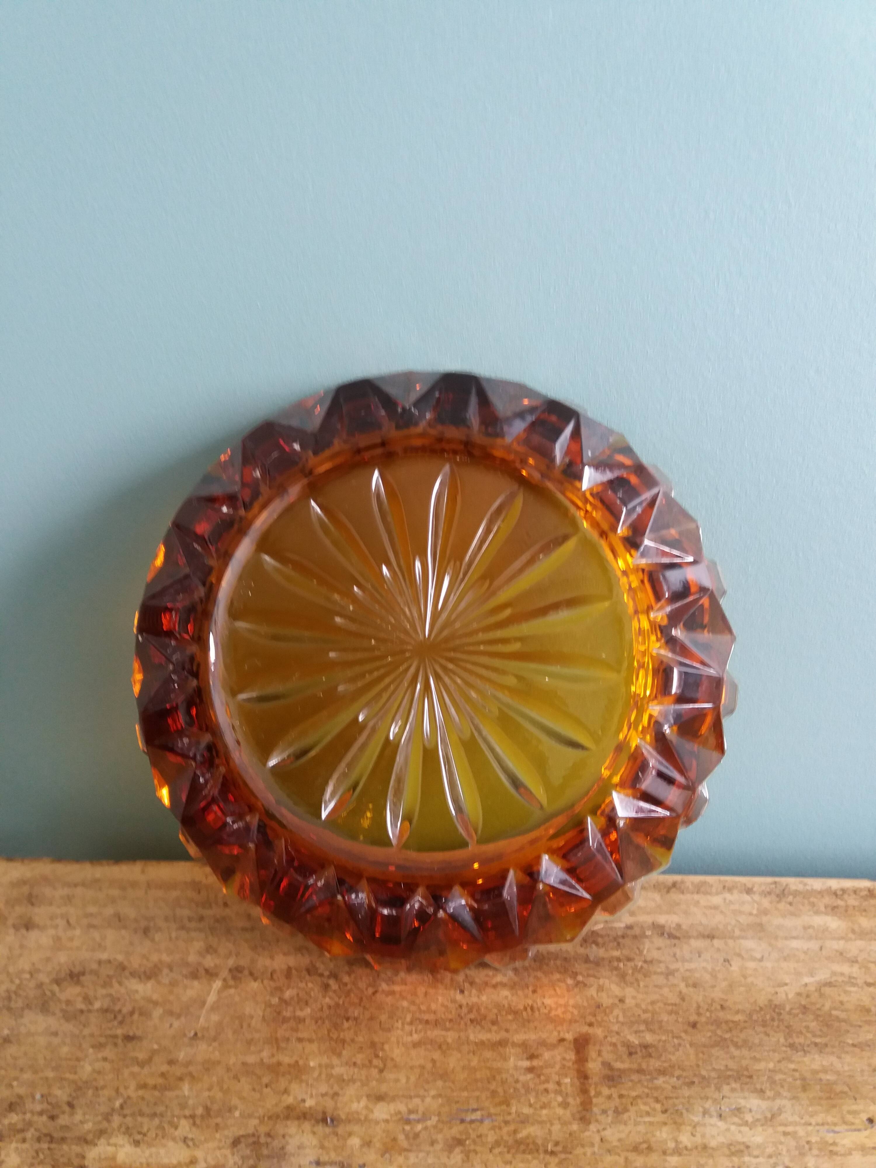 Amber glass ashtray