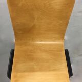 Set of 4 stacking chairs by Roland Rainer