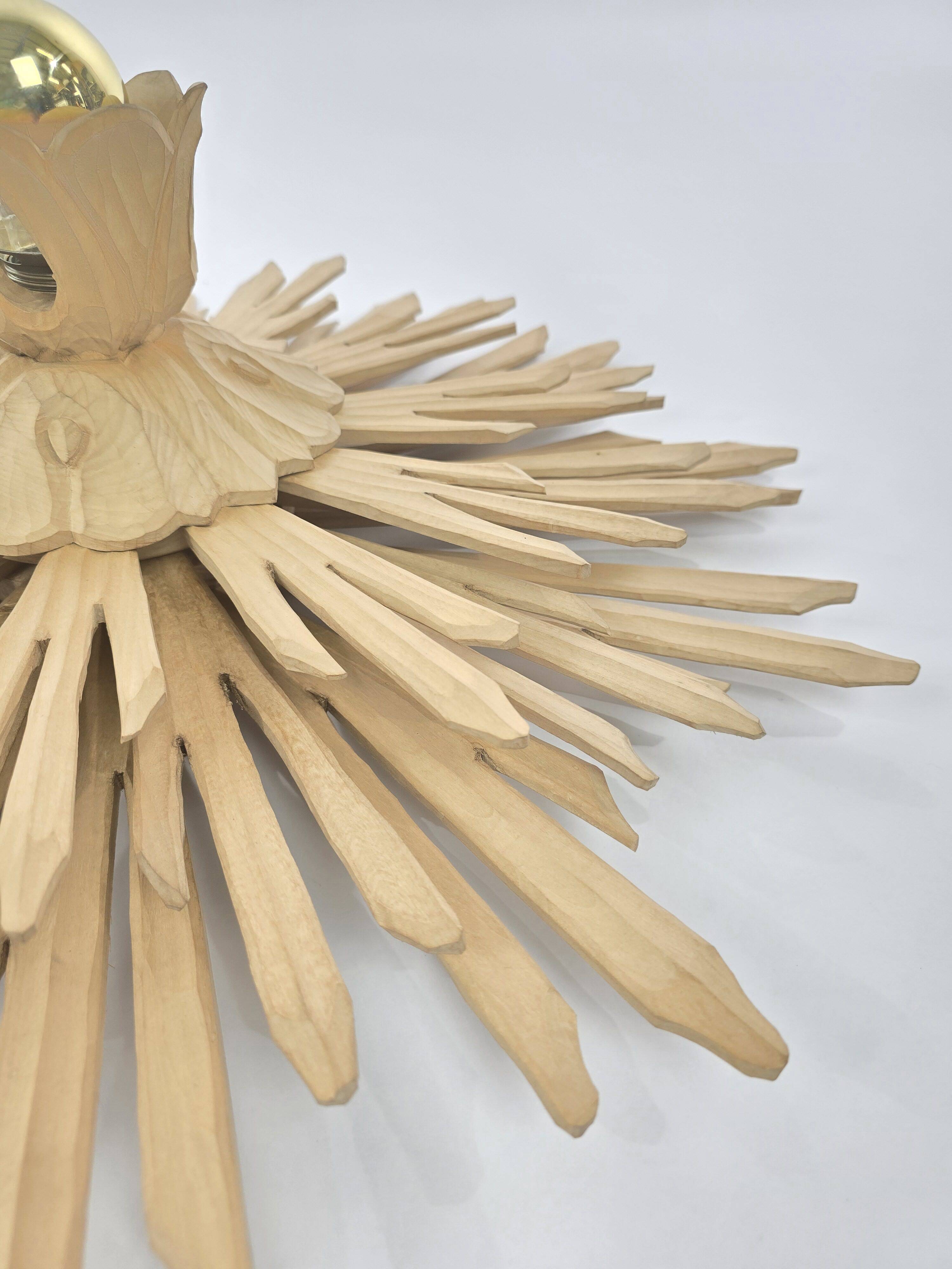 Giant sunburst wall lamp