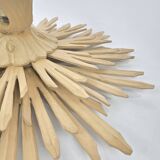 Giant sunburst wall lamp