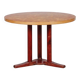 Round wooden dining table from the 1980s.