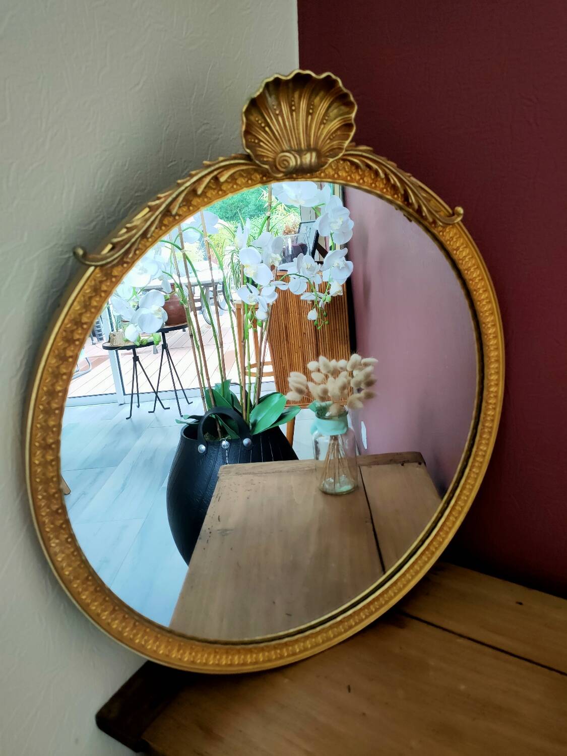 Large round gold metal mirror