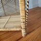 Rattan shelf on legs circa 1960