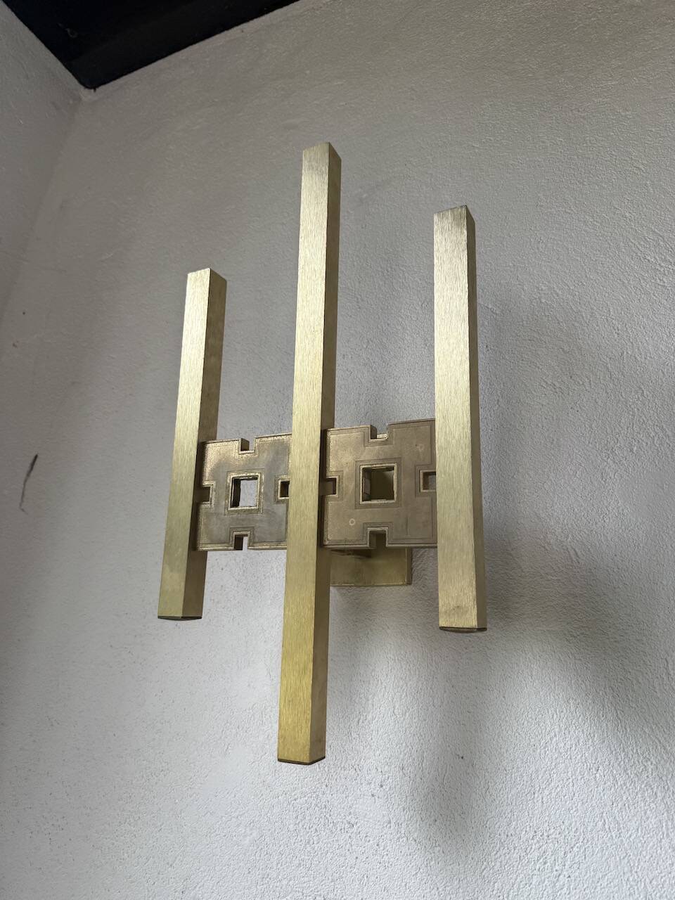 Pair of Regency brass wall lights in Italy