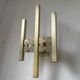 Pair of Regency brass wall lights in Italy