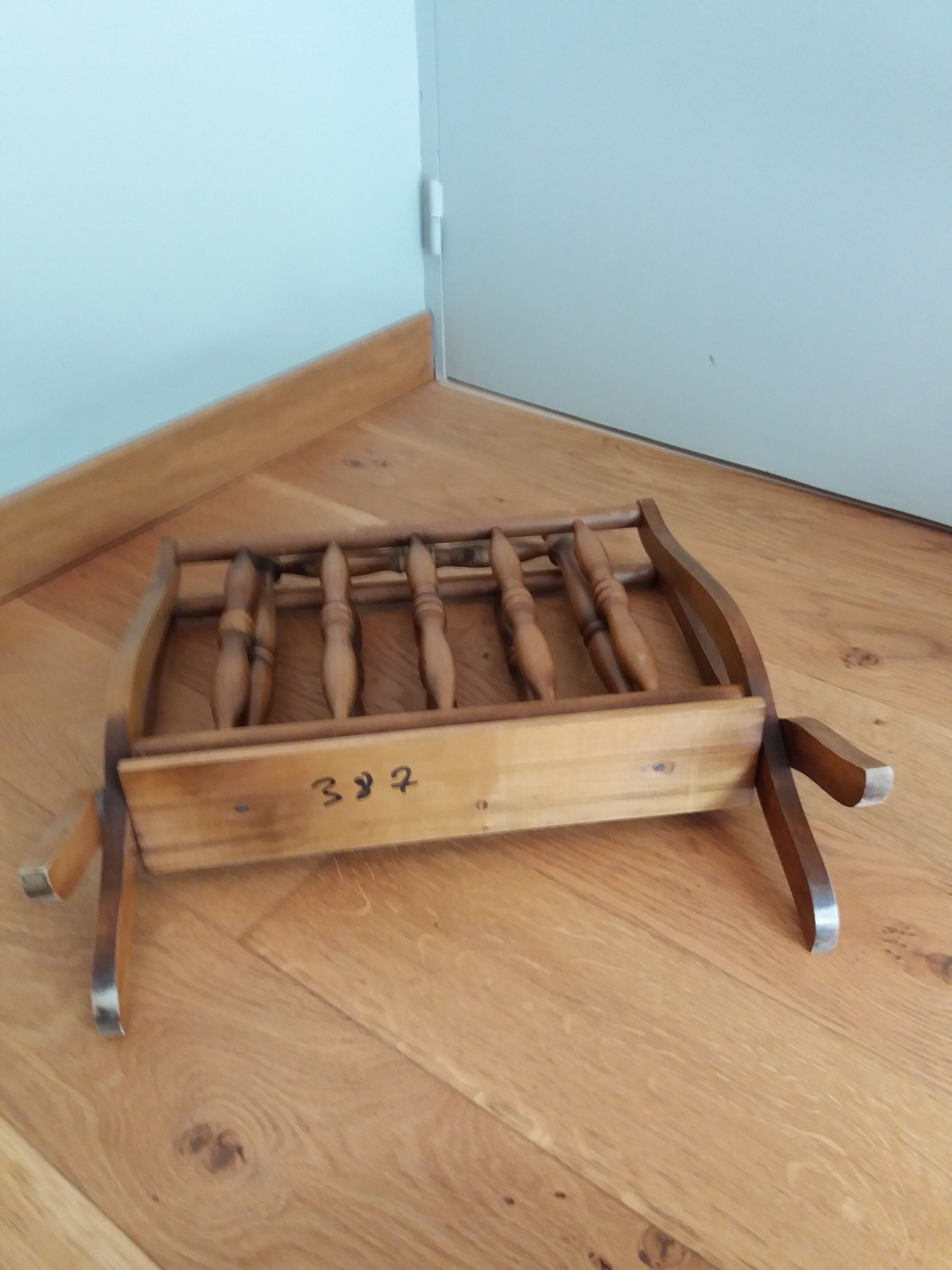 Turned wooden magazine holder