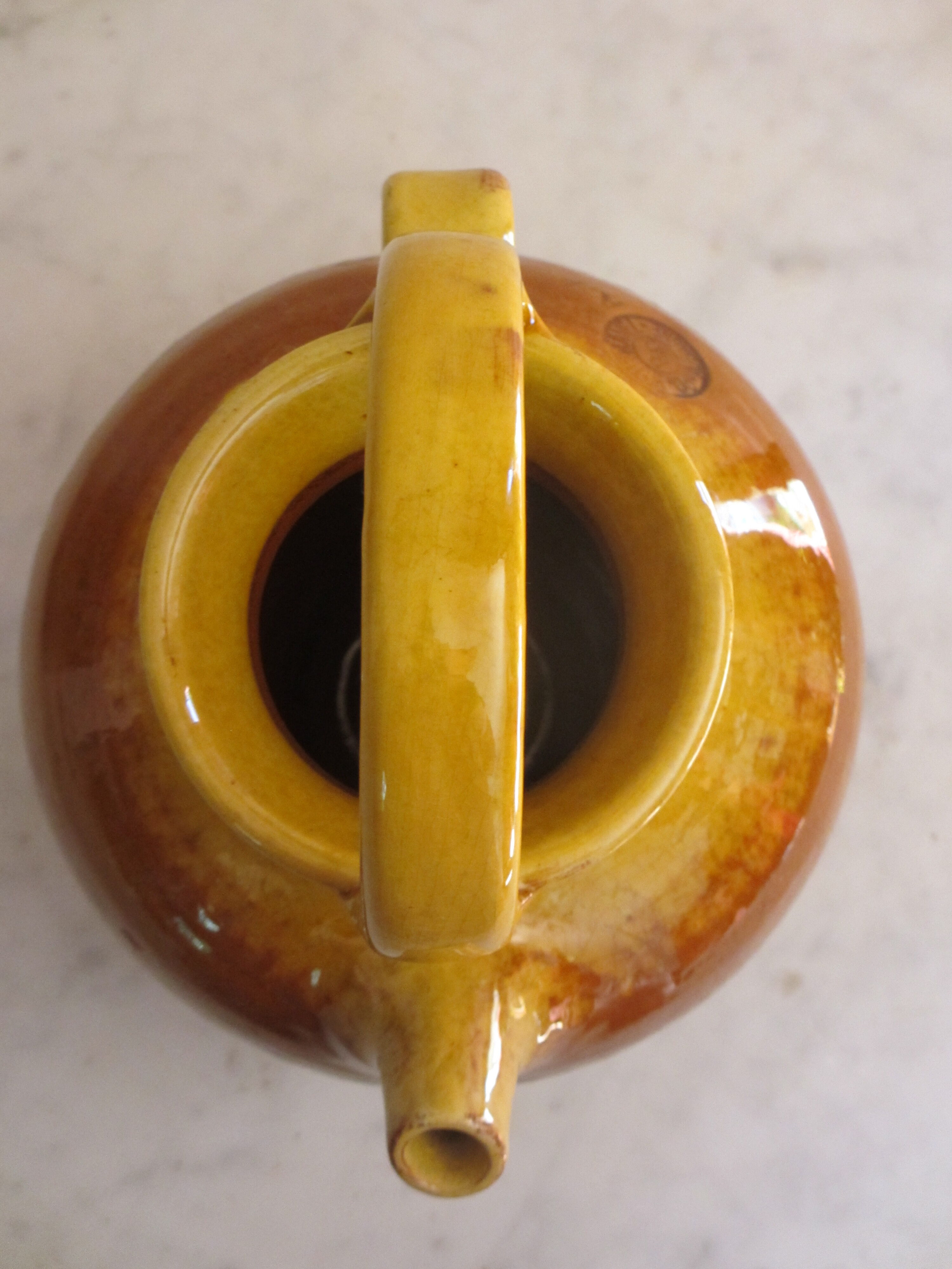 E-mailed terracotta jug or kid.