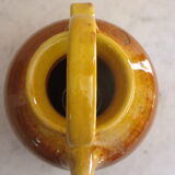 E-mailed terracotta jug or kid.