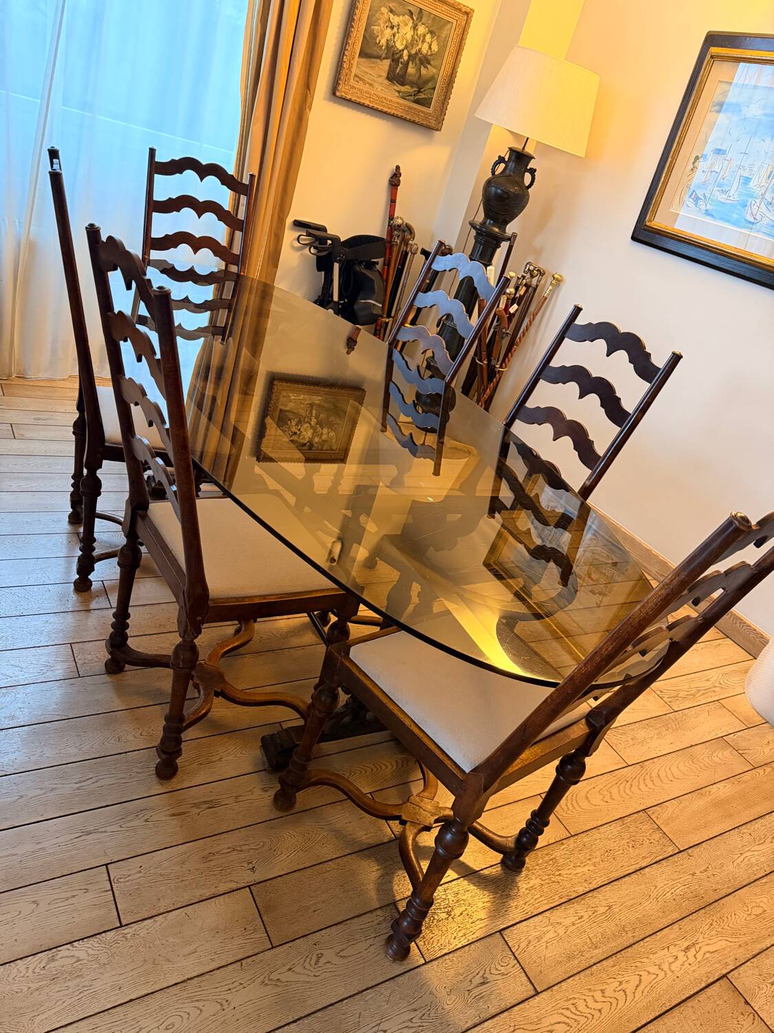 Large antique dining table in wrought iron and smoked glass,