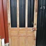 Ancient paneled solid oak door with 3 windows