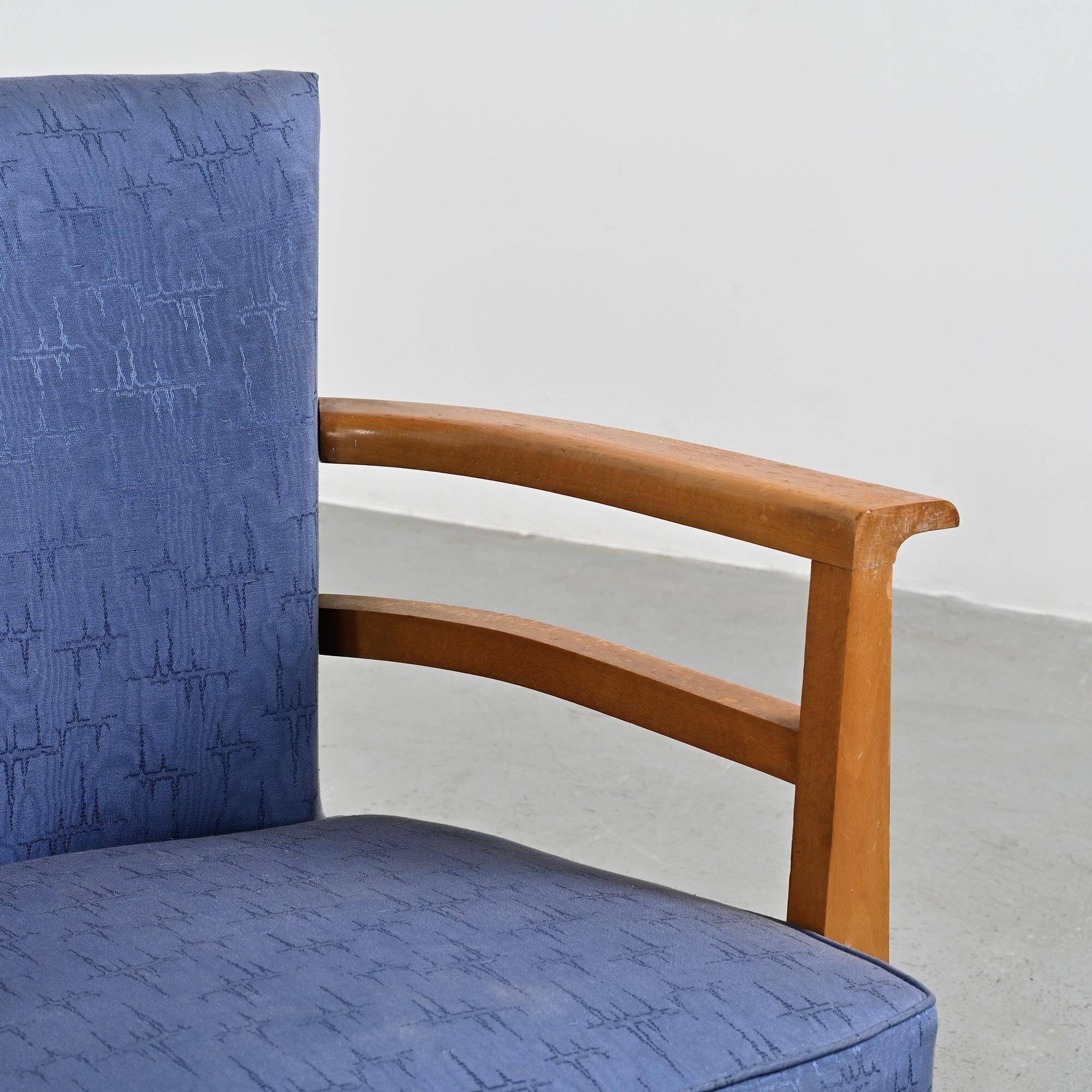 Pair of living room armchairs in solid beech, France, circa 1950.