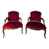 Paire de fauteuils époque Louis XV – Bois sculpté, velours bordeaux