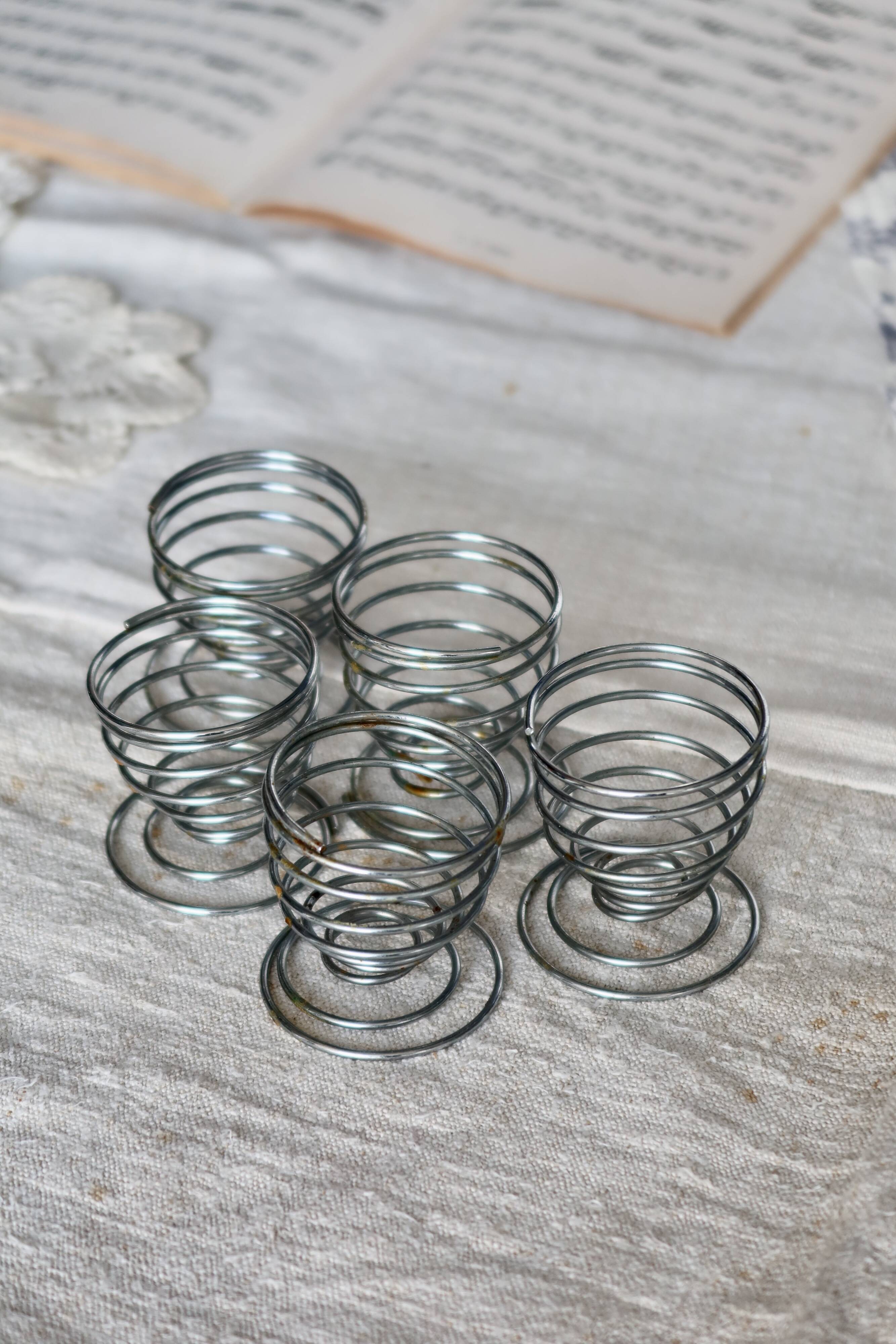 5 vintage silver metal spring egg cups
