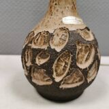 Small beautiful ceramic table lamp in earth colors.