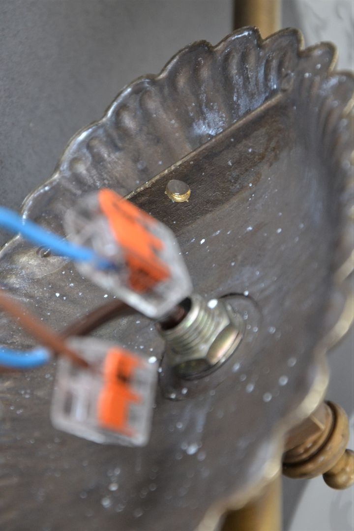 Pair of engraved glass wall lamps, brass support