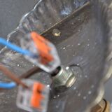 Pair of engraved glass wall lamps, brass support