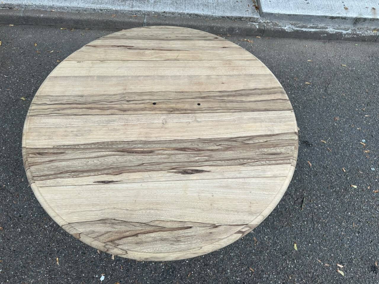Round extendable dining table with flaps, stripped in raw oak, with 4 extensions.