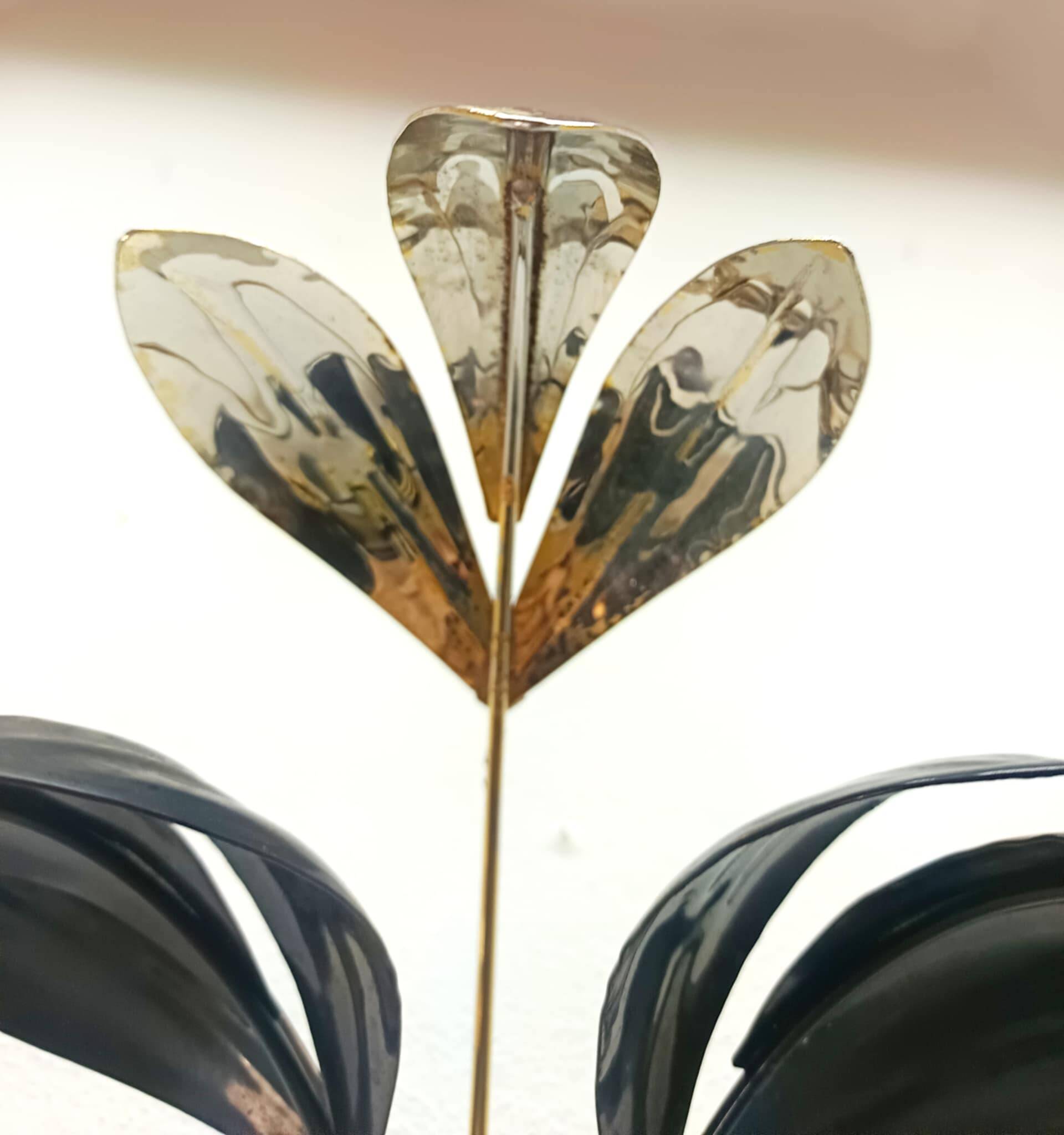 Black and gold Hollywood Regency leaf wall sconce