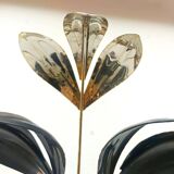 Black and gold Hollywood Regency leaf wall sconce
