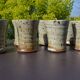 8 stoneware cups/mugs by Gustave Tiffoche
