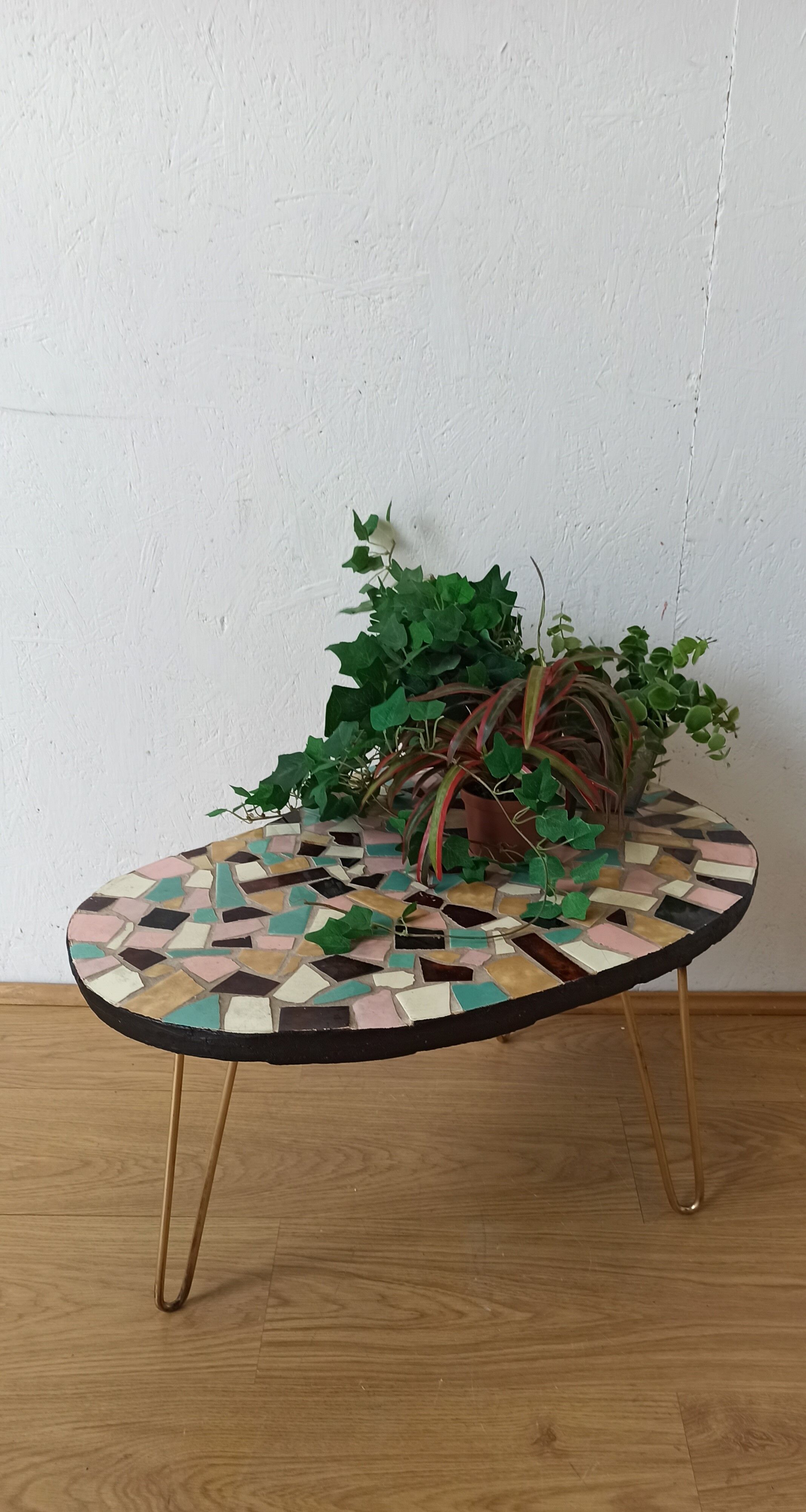 Unusual coffee table on three legs