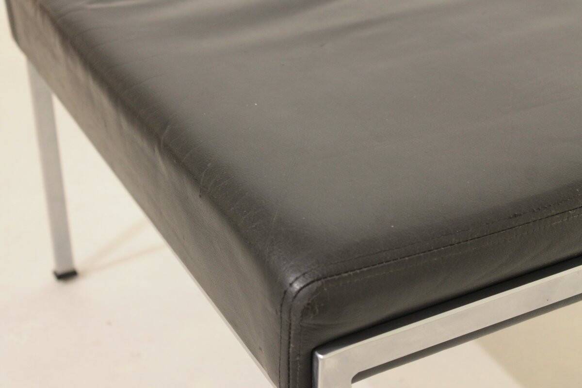 Pair of designer leather and brushed stainless steel footrests - Rob Parry