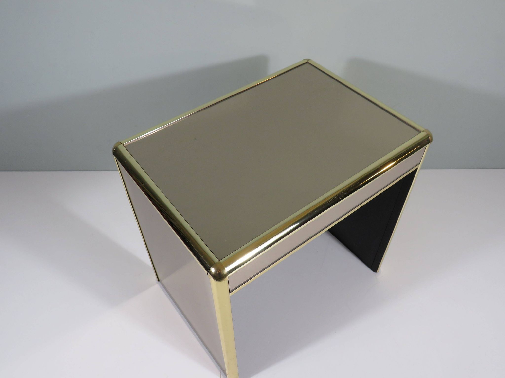 Occasional table or side table in Hollywood Regency style.