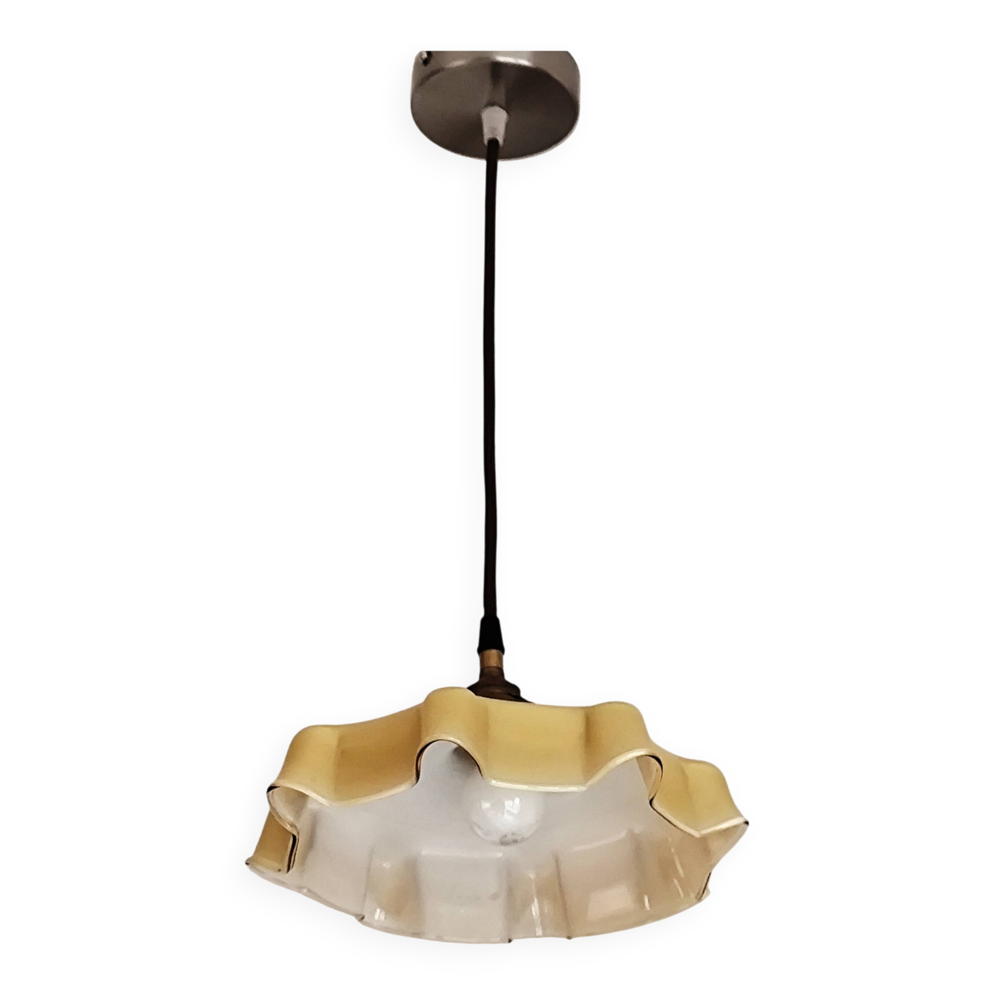 Electrified suspension with a frosted opaque glass disc shade.