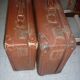 Pair of red suitcases from the 1950s