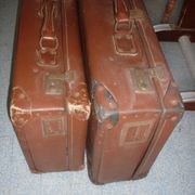 Pair of red suitcases from the 1950s