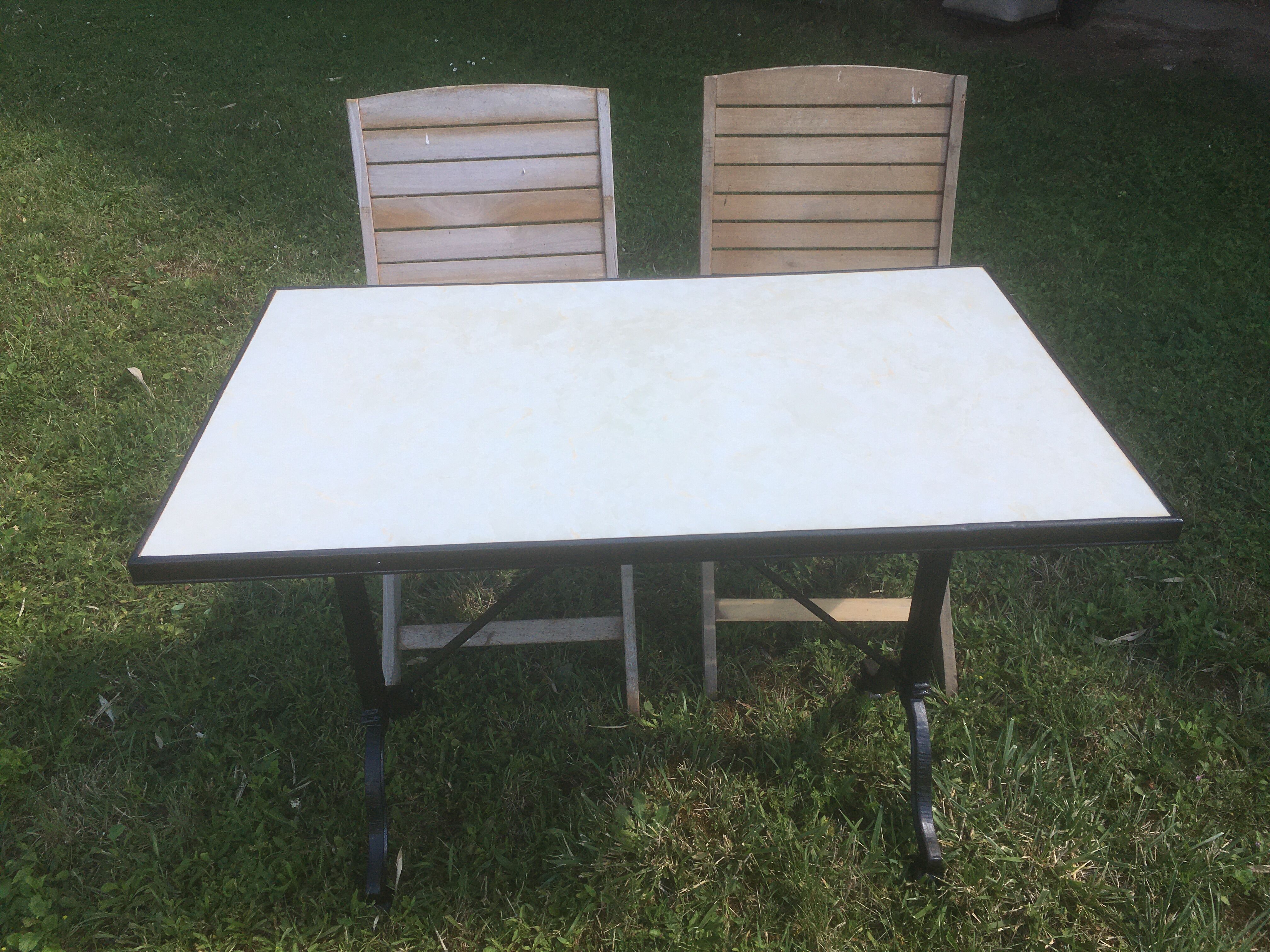 Bistro table with cast iron base