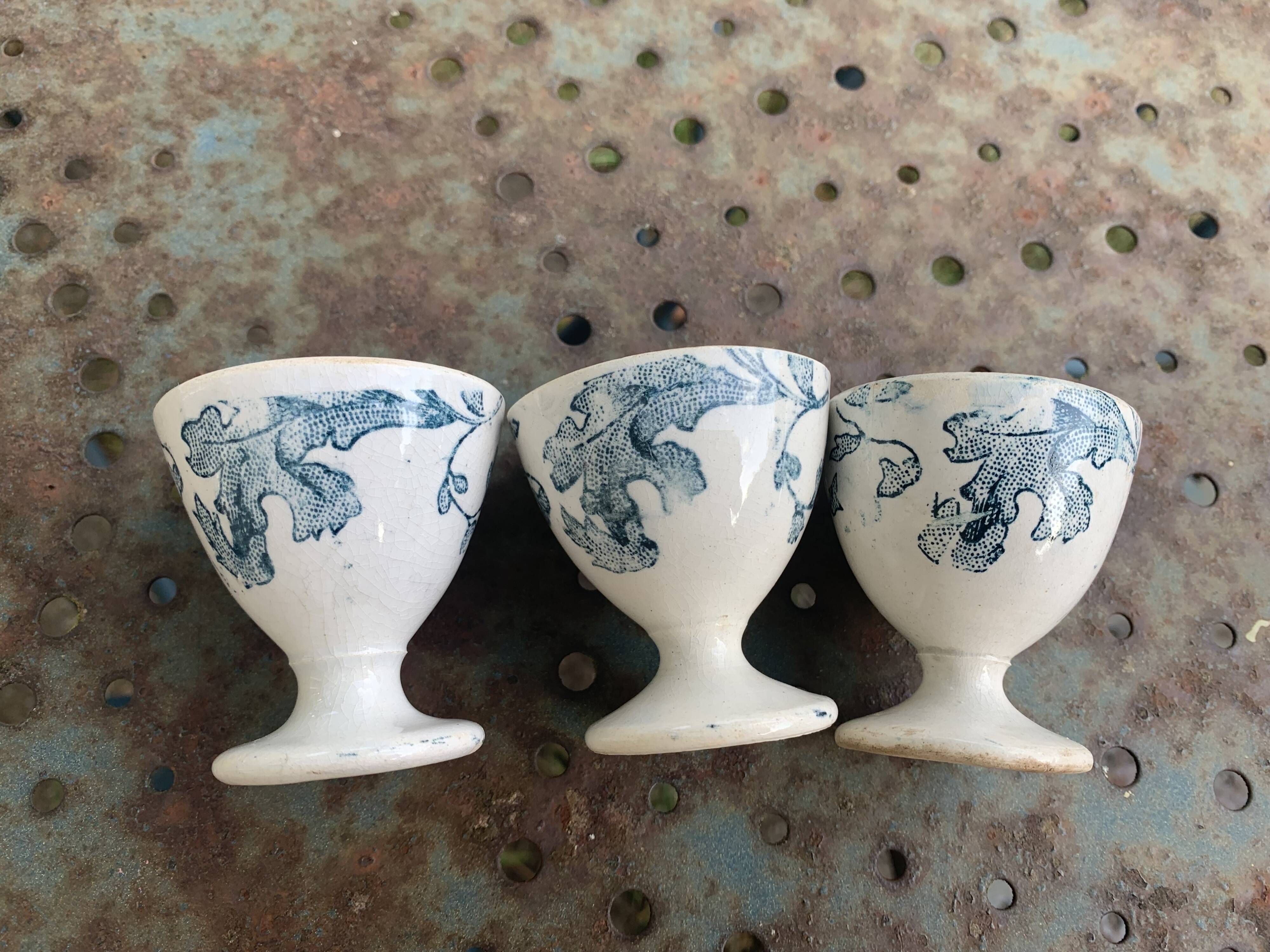 3 white earthenware egg cups, blue foliage decor, Grigny fire clay, made in France
