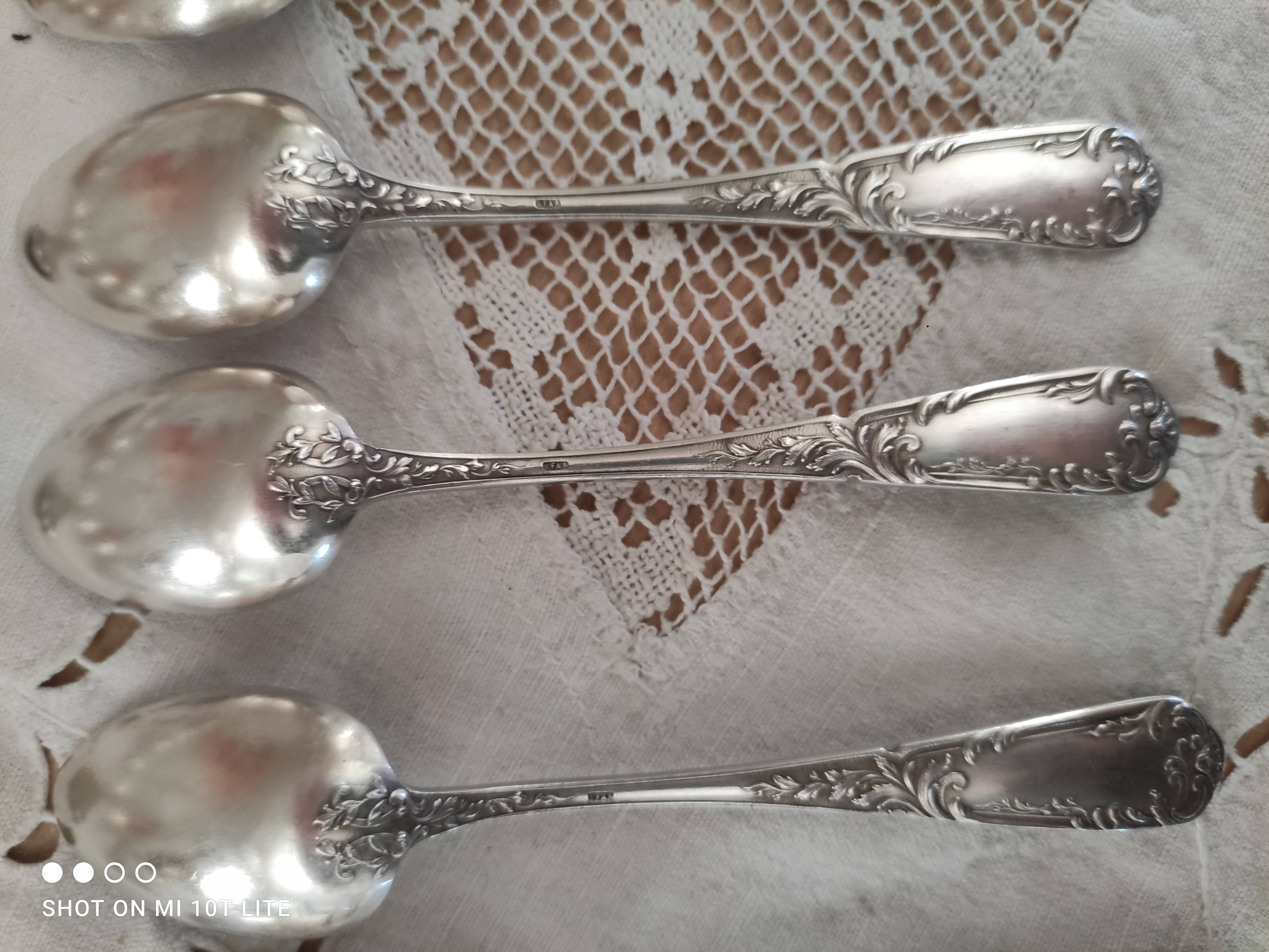 Lot of 12 small old spoons in silver metal