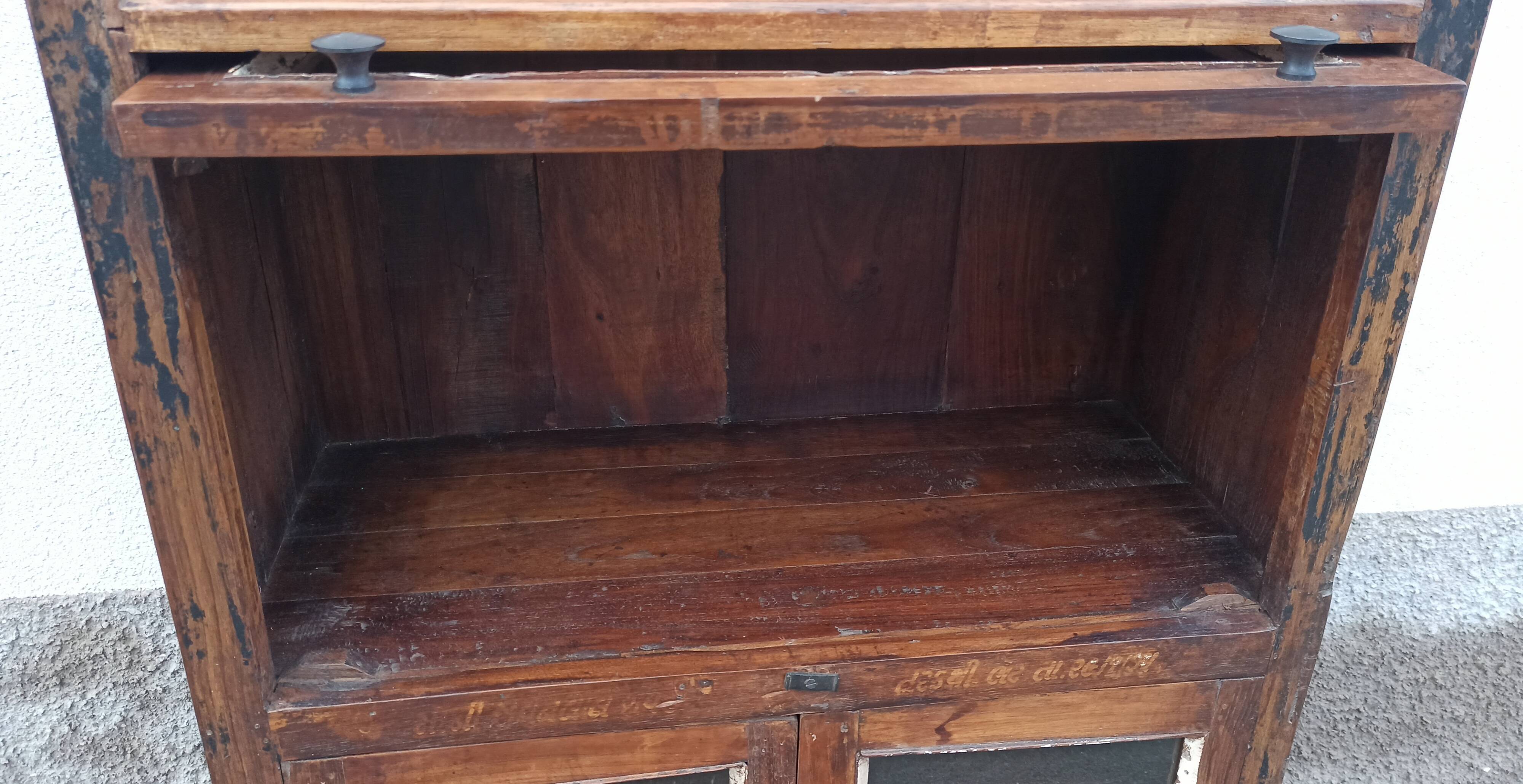 Small wooden glass cabinet with retractable door