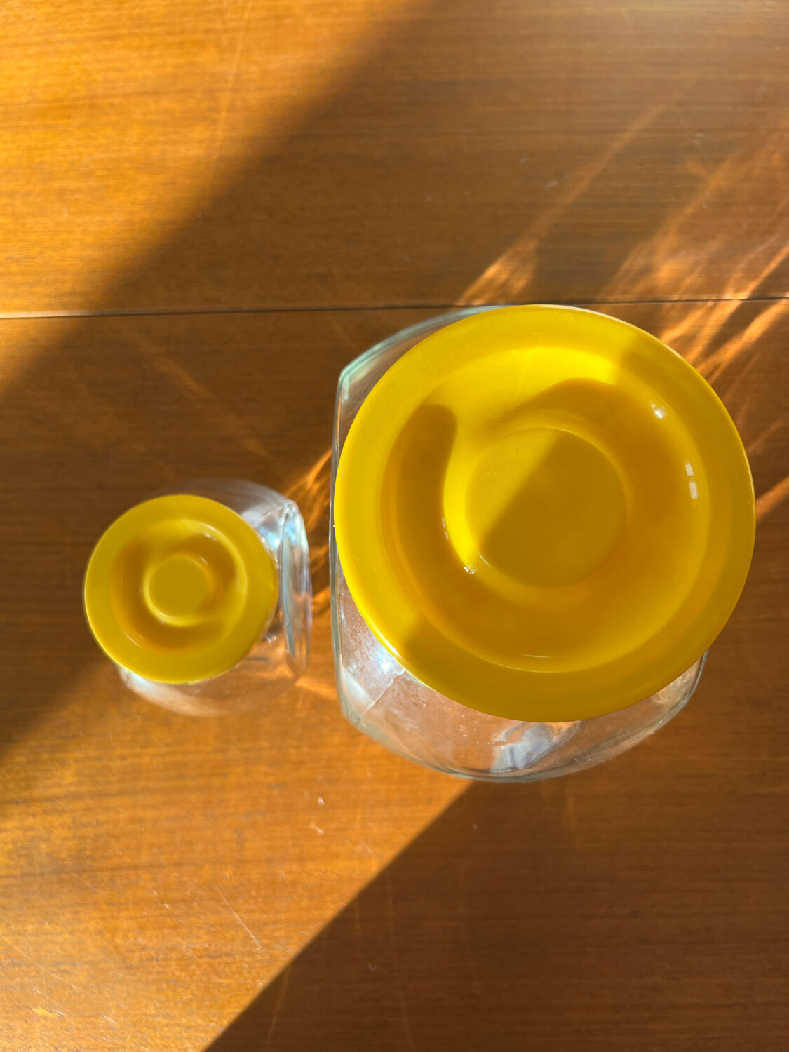 Pair of yellow vintage candy jars