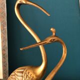 Couple of brass herons