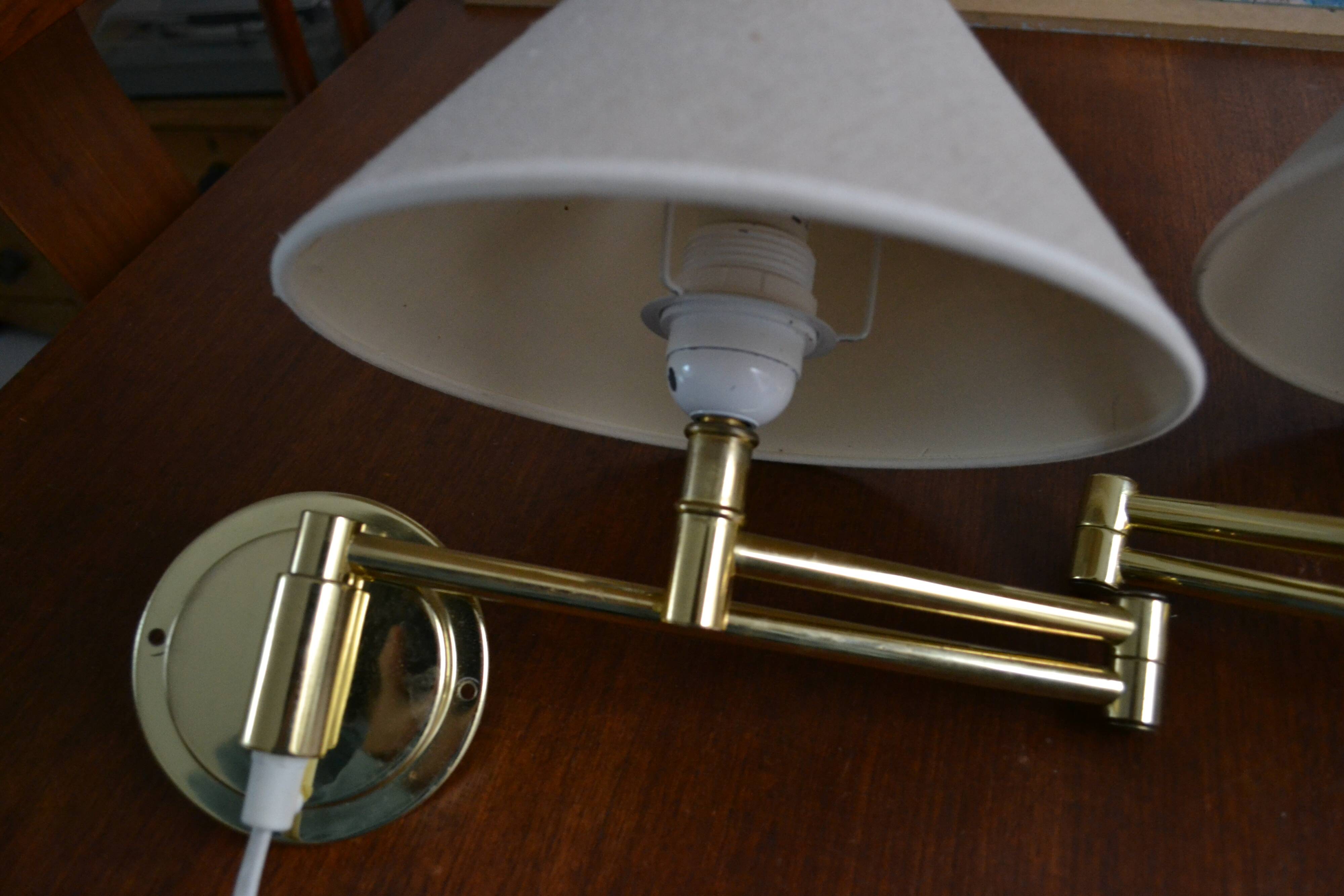 Pair of vintage gold articulated sconces