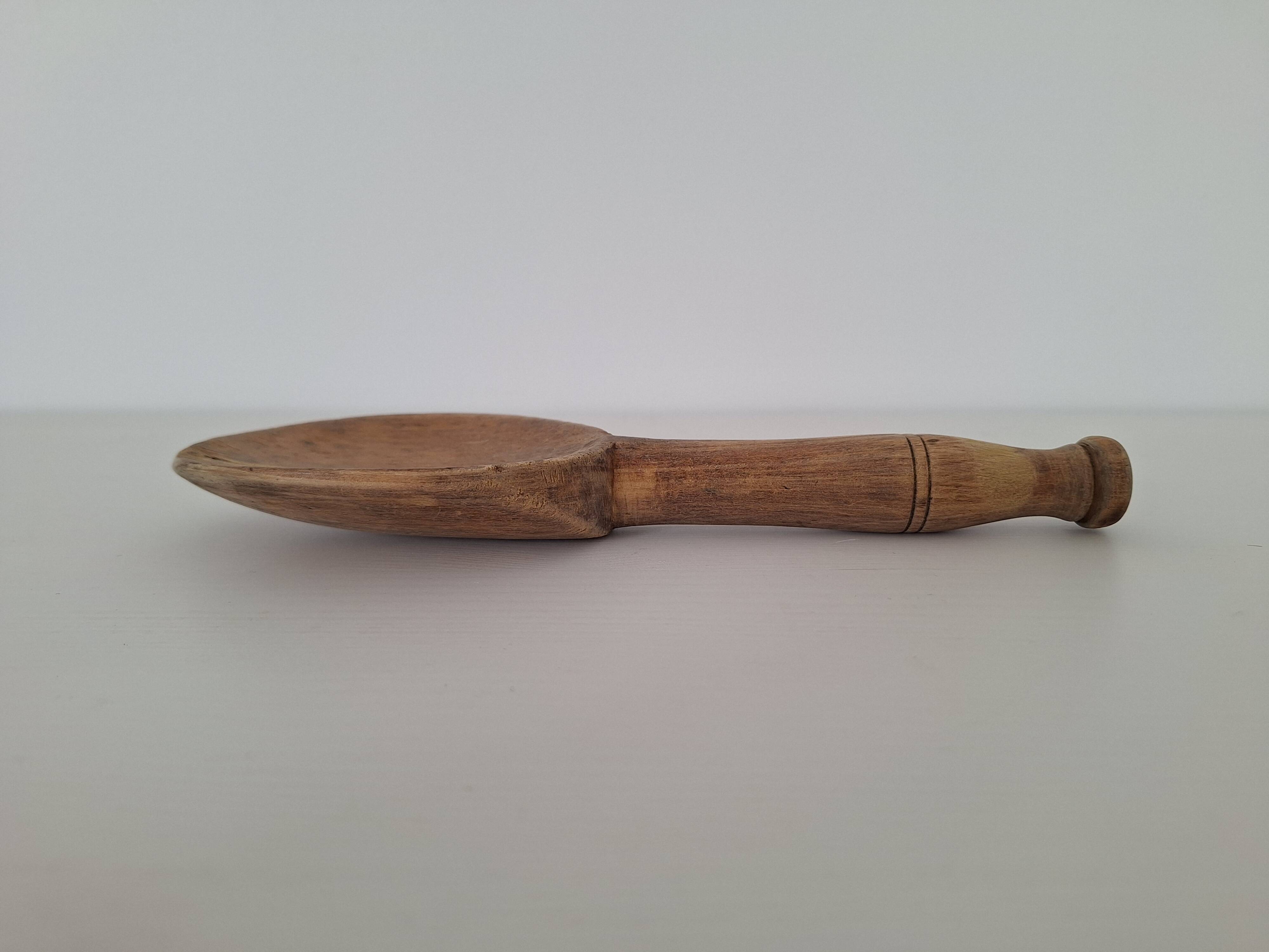 Vintage wooden butter spoon