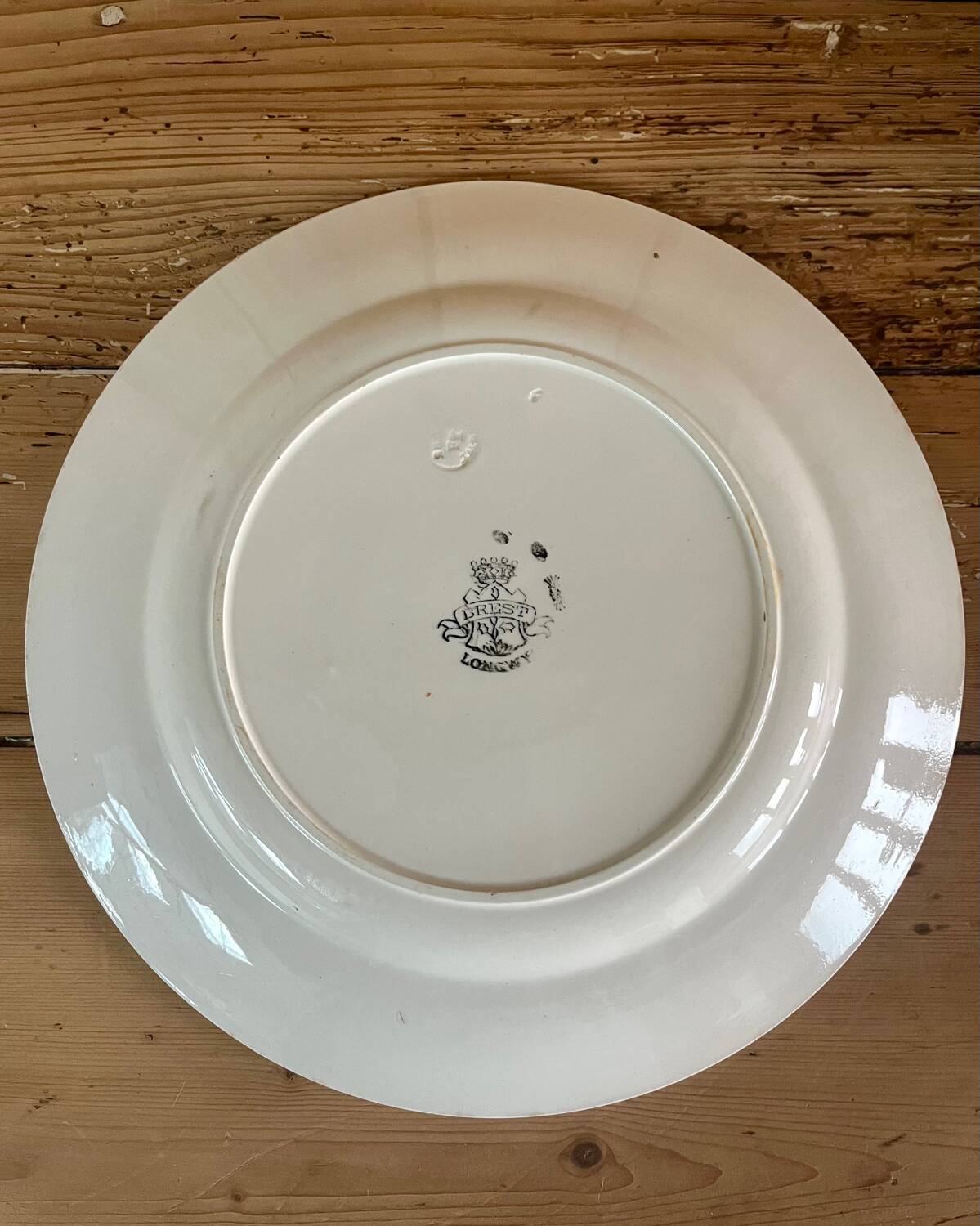 Large round iron earth dish Longwy Brest