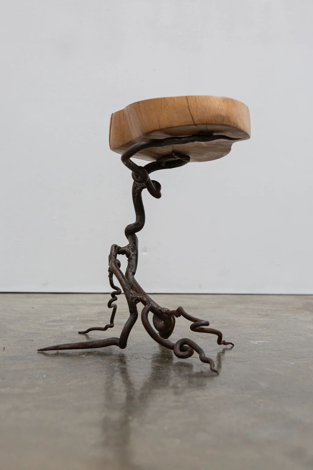 Brutalist artisanal wrought iron and slab wood side table