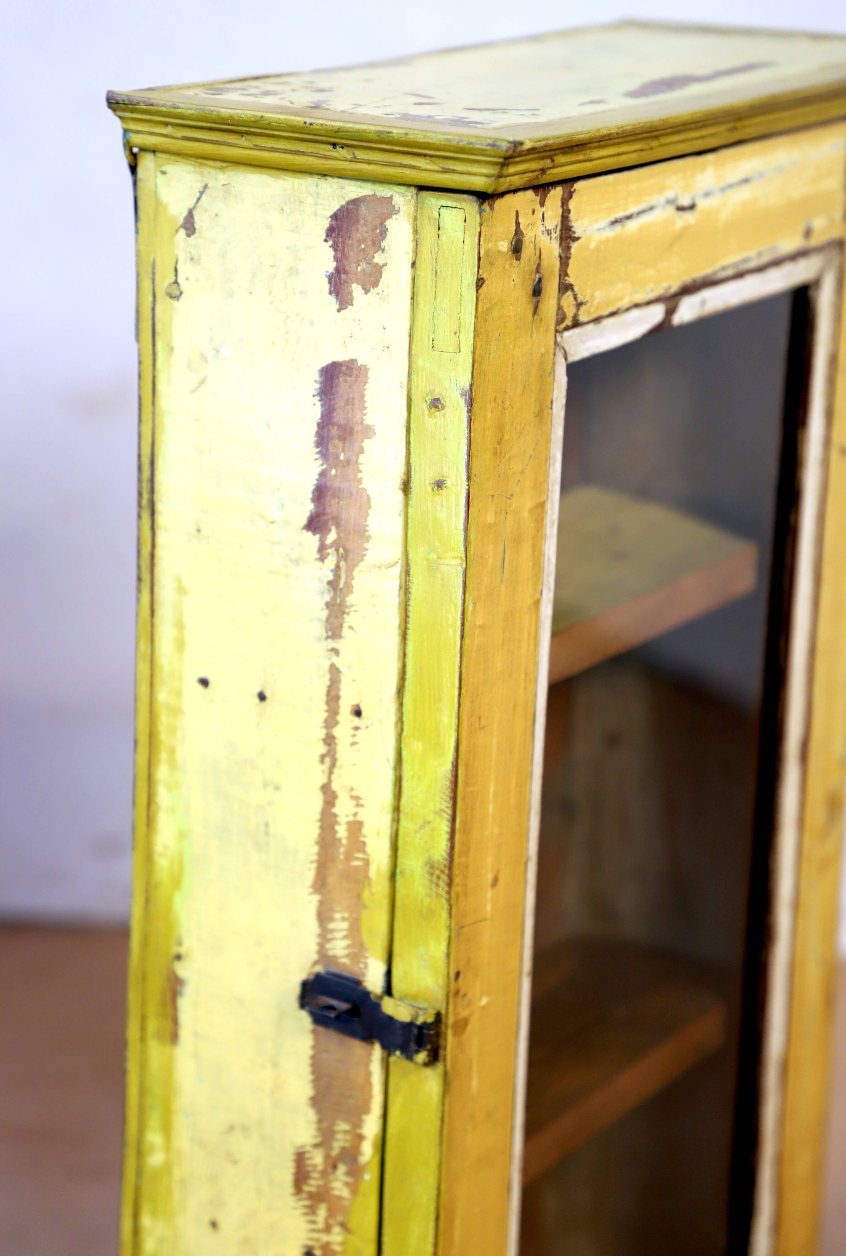 Burmese teak wall shelf with original yellow patina