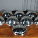 Suite de 8 cloches en inox service de table XXe