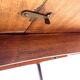 Danish round dining table in rosewood – 1950s design with butterfly extension.