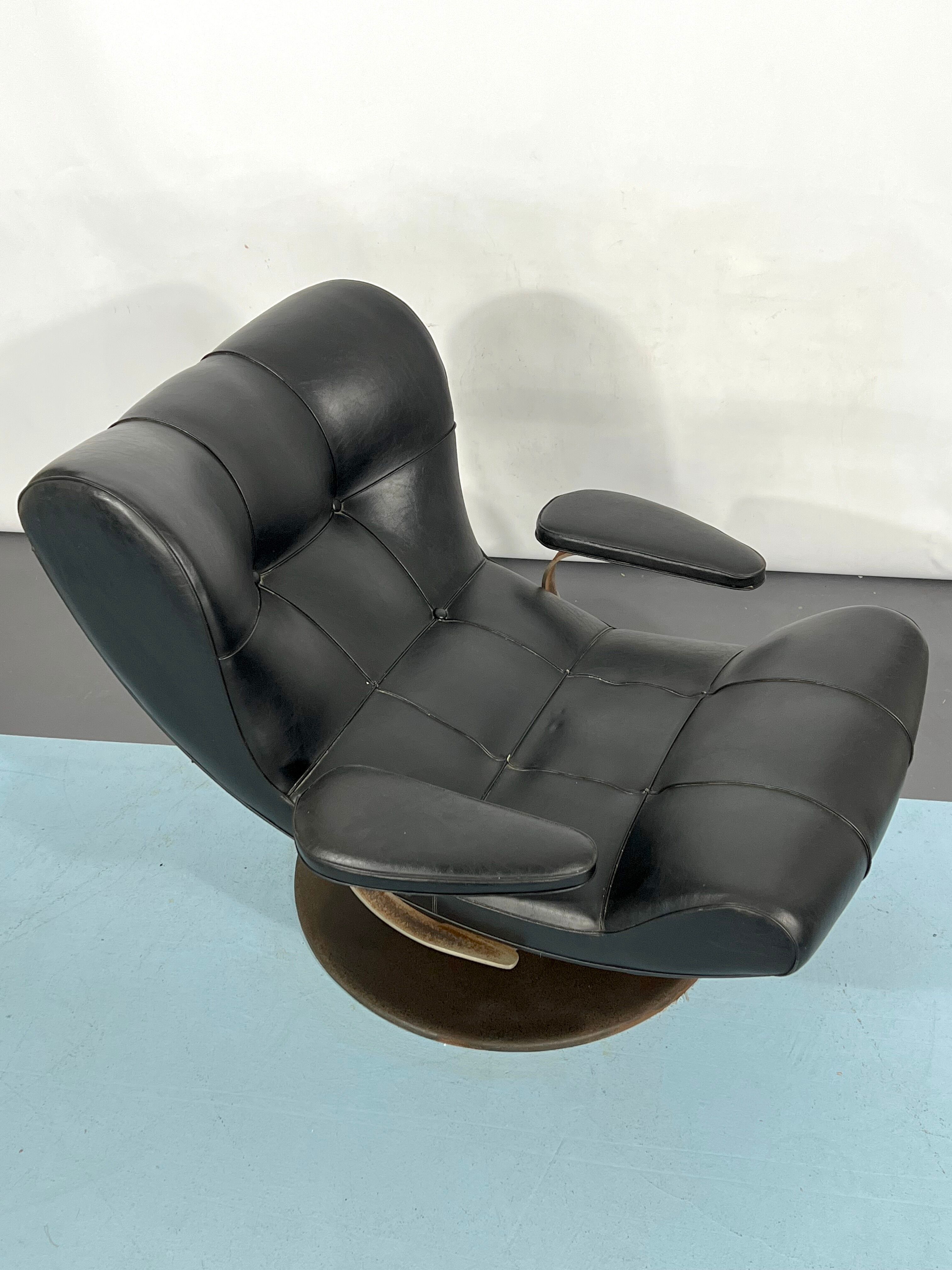 Vintage Italian black swivel armchair from 60s