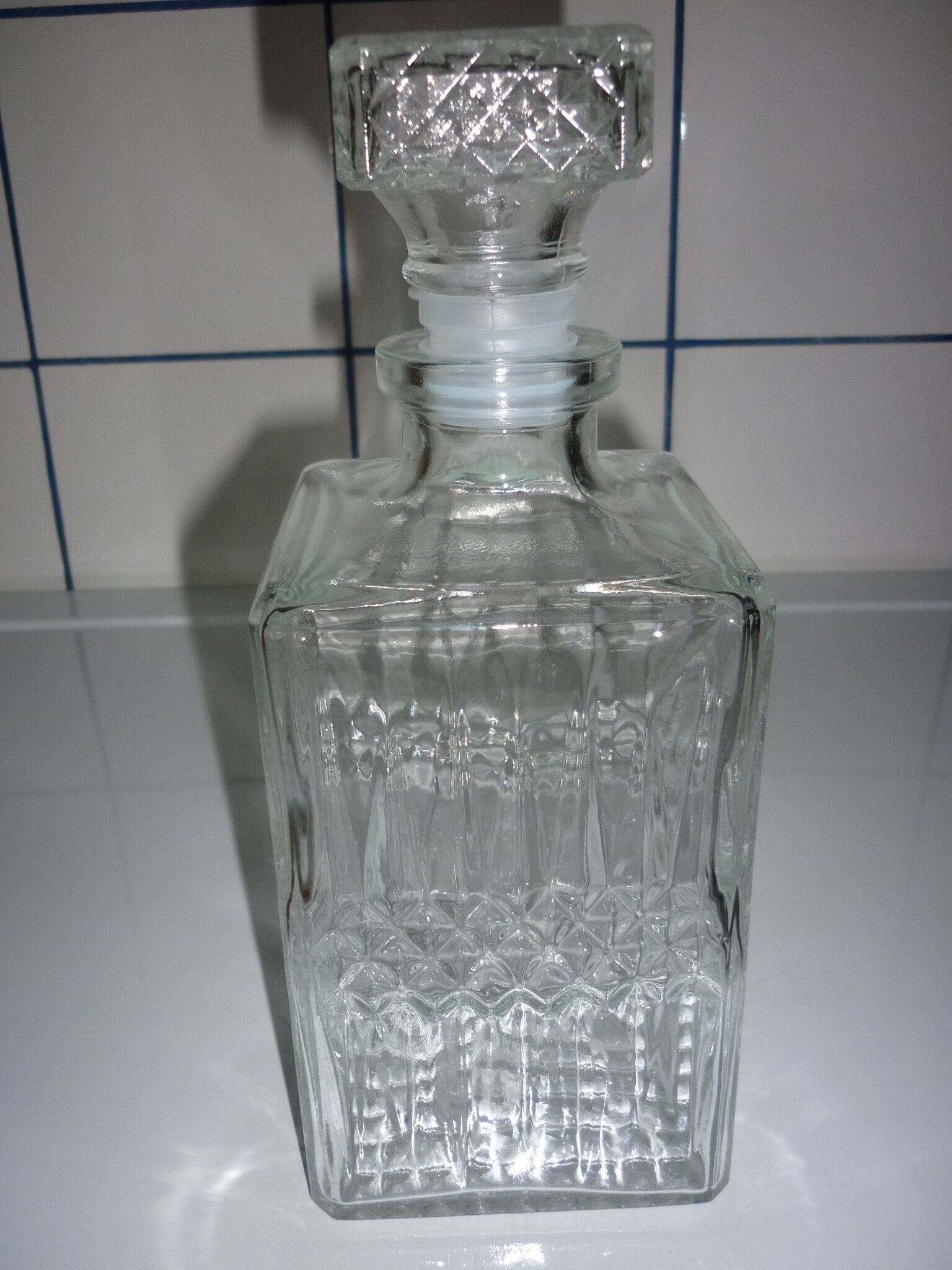 Square cap glass carafe