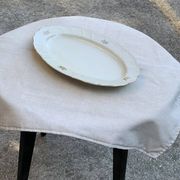 Large yellow porcelain serving dish by Bernadotte from the 1960s, with a gold rim and relief.