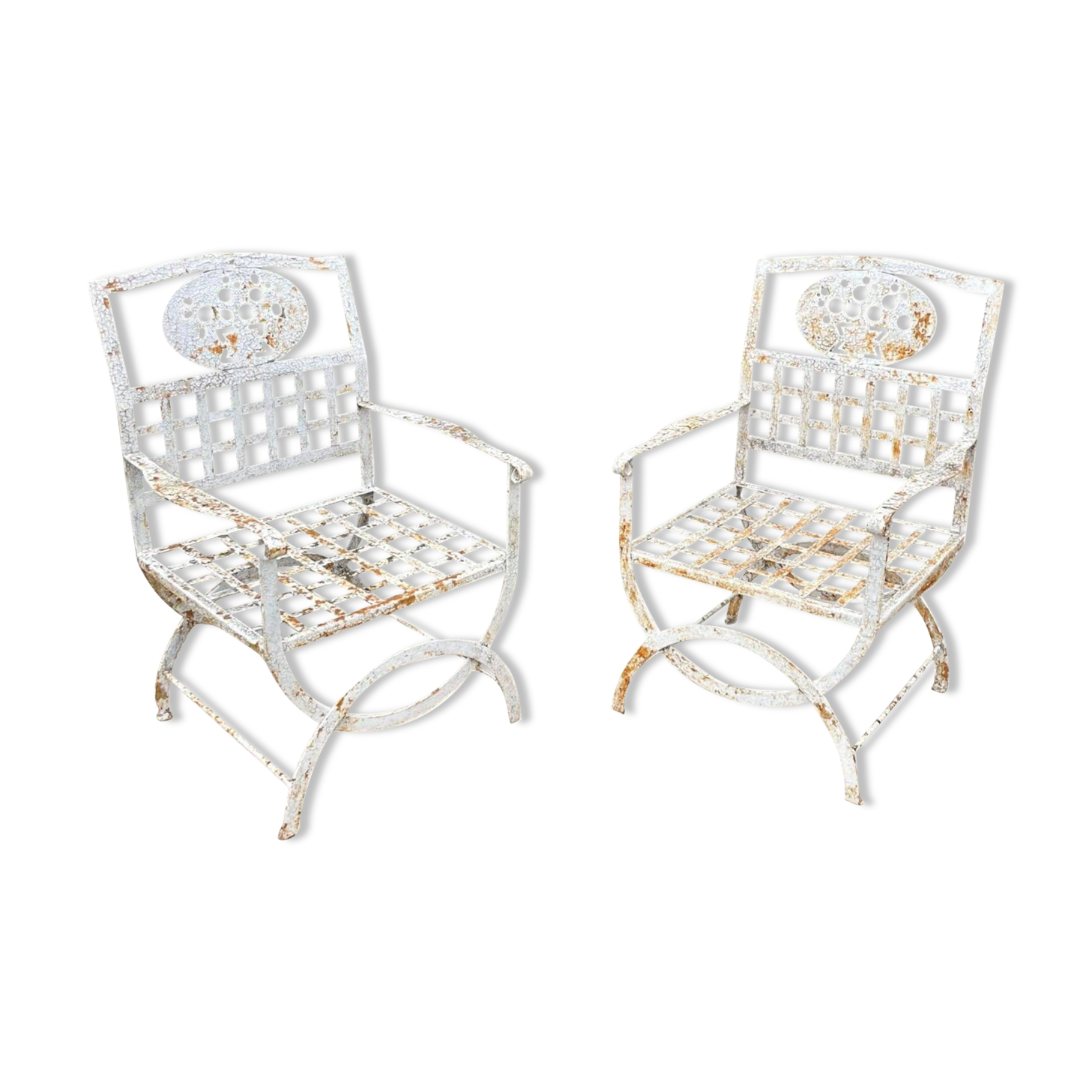 Pair of wrought iron armchairs